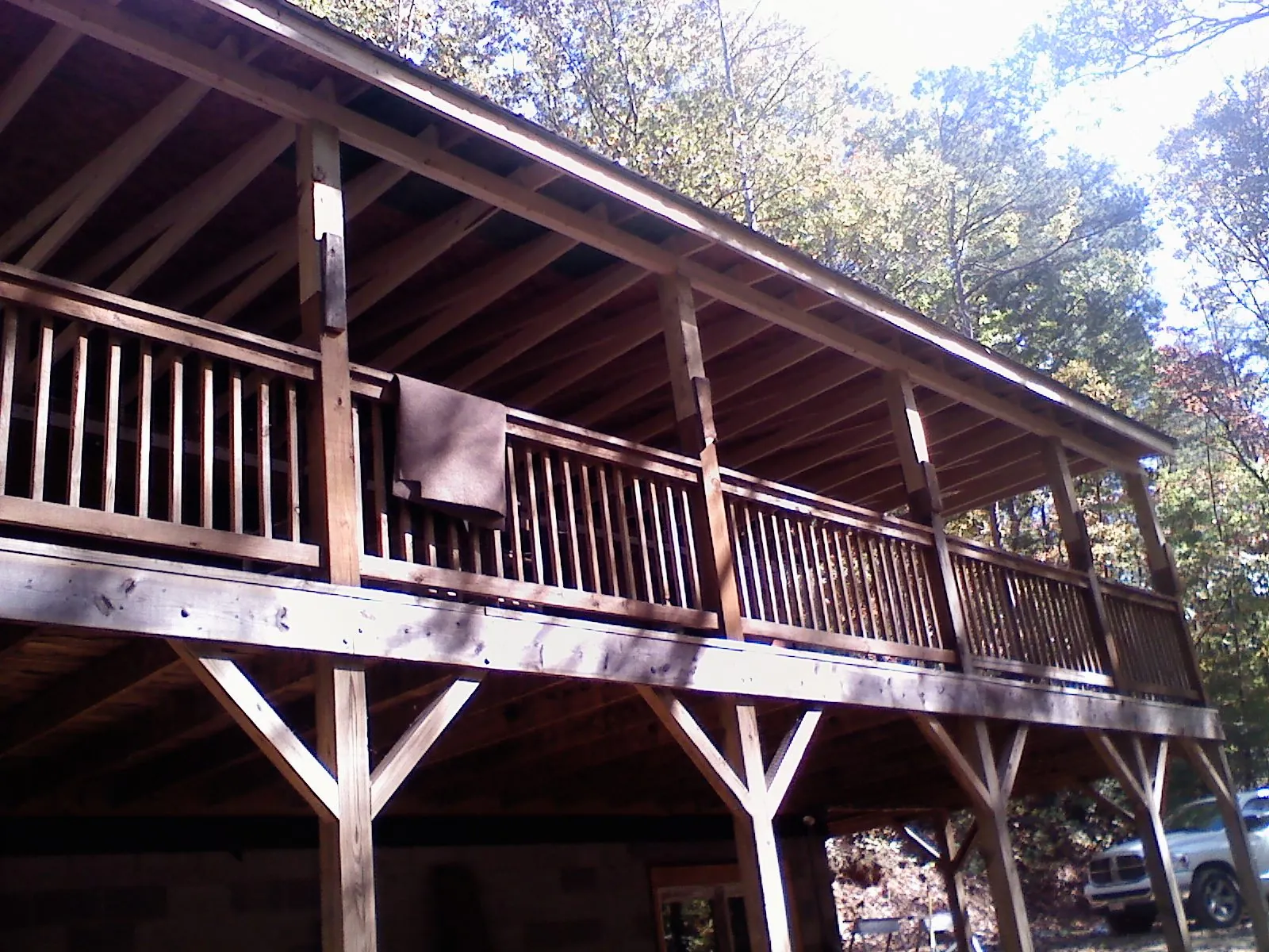 Timber framing under a new elevated porch and deck — Roof Leak Repair in Frost by Roofing Brothers